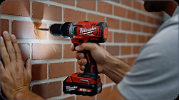 Milwaukee drill in use on brick for PhotoReel product video